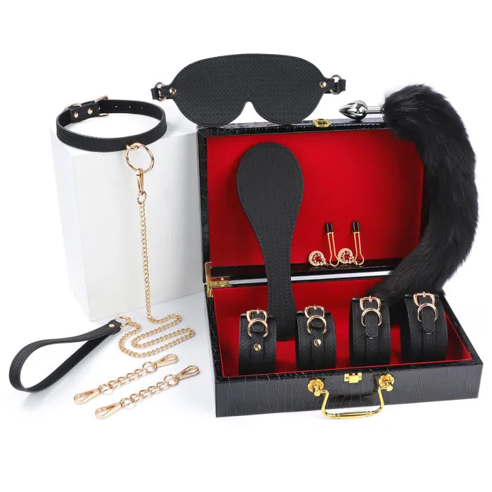 BDSM Kit with 8 pieces - Collar, cuffs, blinder, breast clamp, anal plug and more